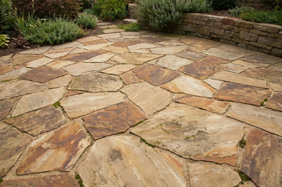 7 Low-Maintenance Flooring Options for Patios and Driveways (And Why Stamped Concrete Stands Out)